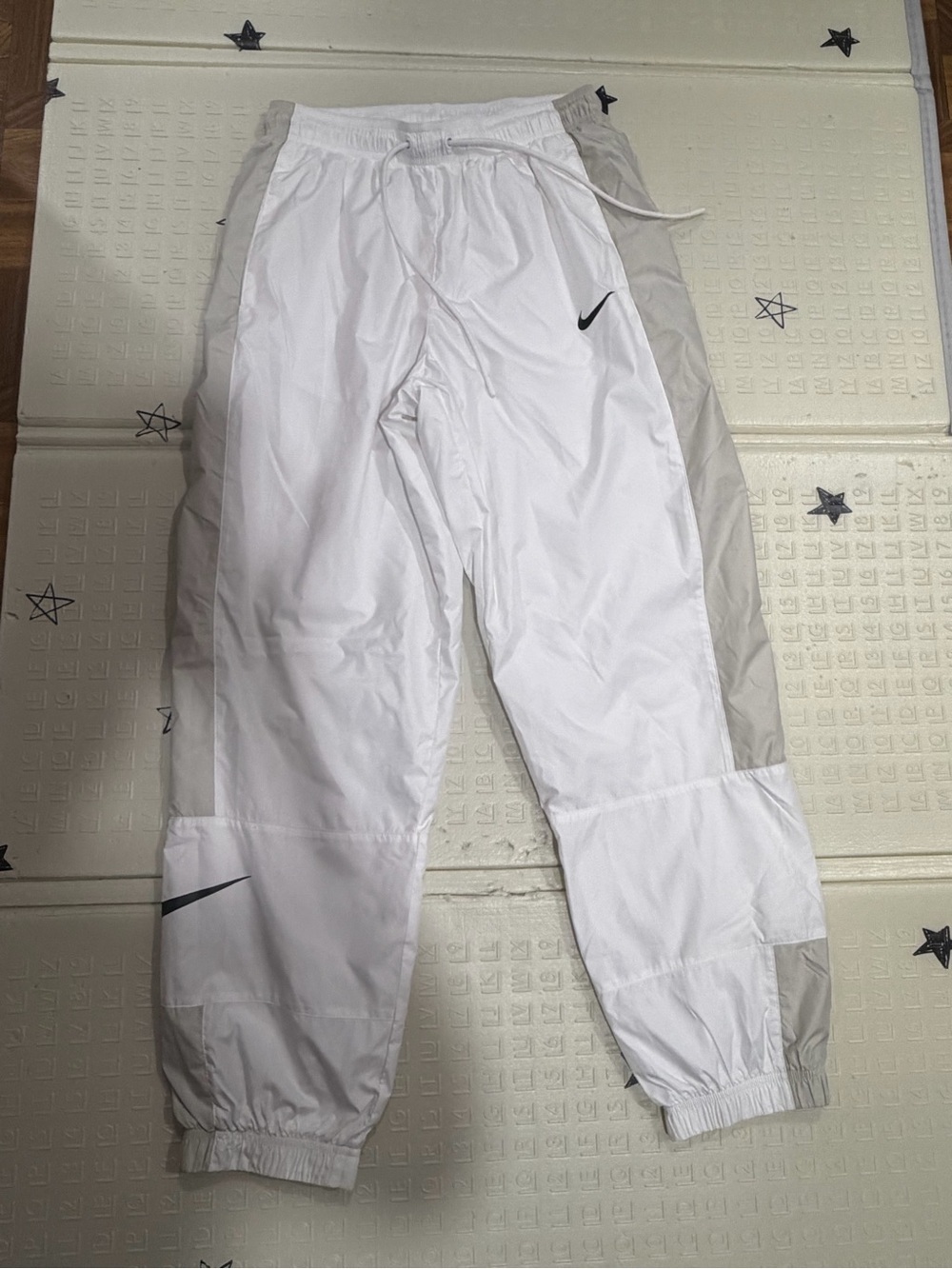 Nike White Mesh Athletic pants with Black Swoosh